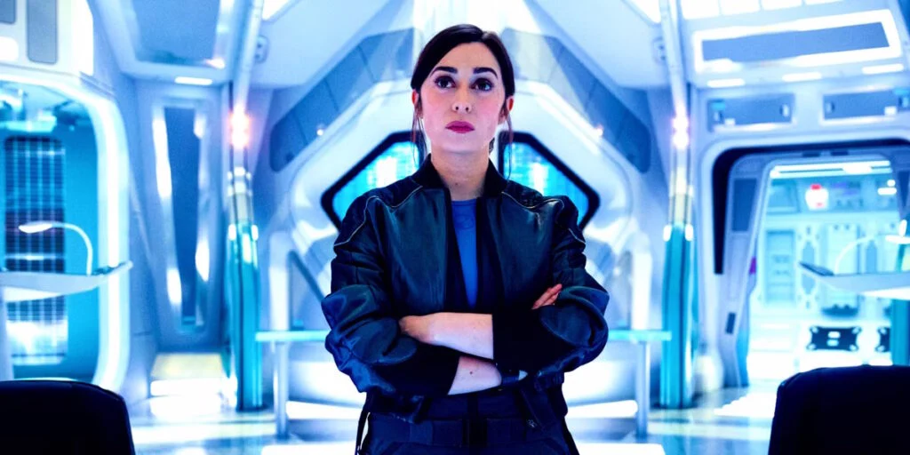 cristin milioti as cole with her arms crossed in black mirror season 7 episode 6 uss callister into infinity 1024x512 1